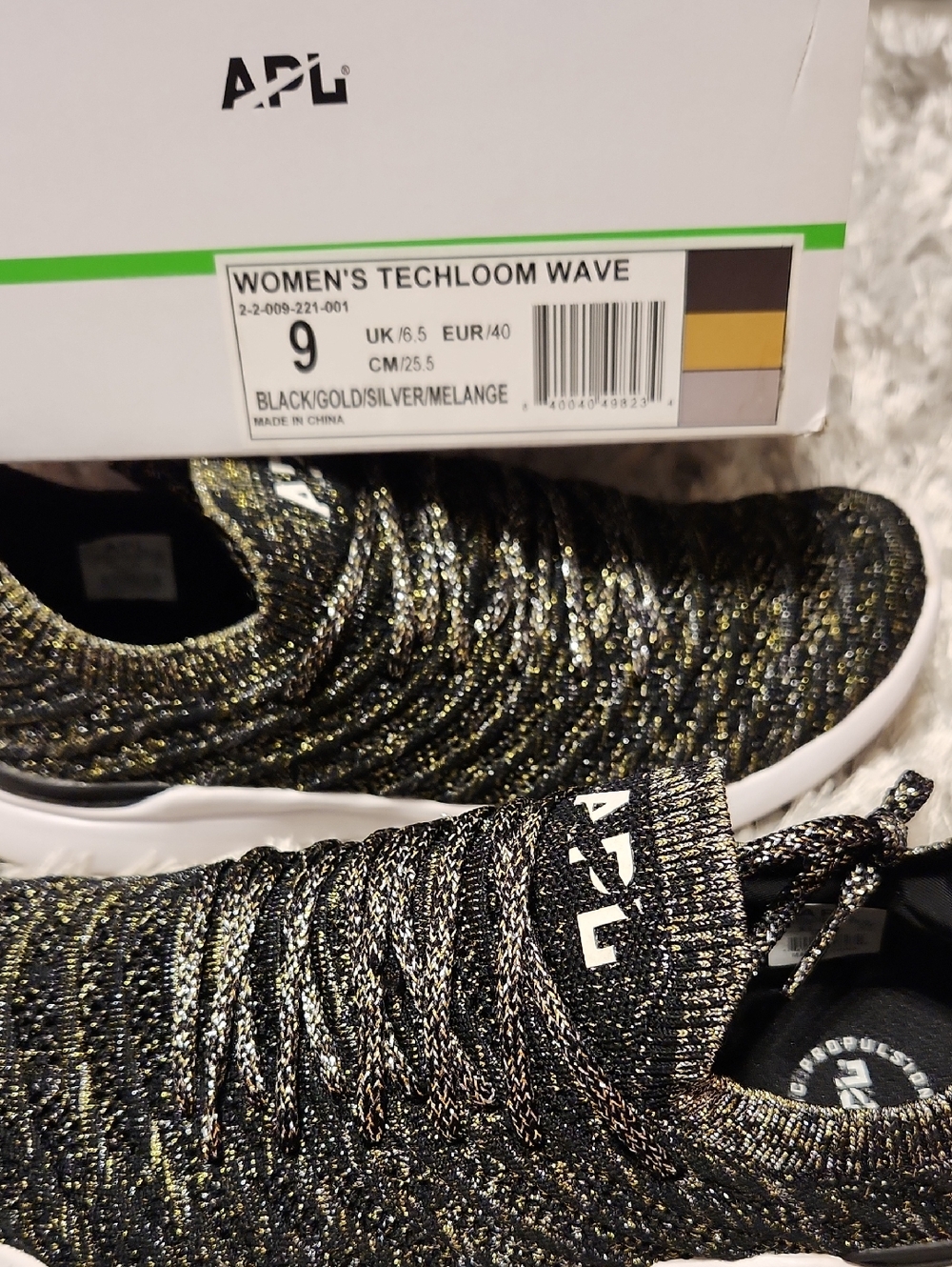 APL Women's Techloom Wave Slip-On Sneaker - Black & Gold